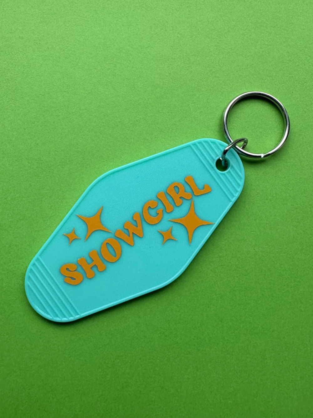 Hand made Turquoise and Orange 'SHOWGIRL' Retro Motel Keychain